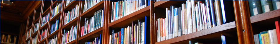 Photo of books on shelves.