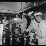 Hoffman Island, merchant marine training center off Staten Island, New York. Trainees for steward's rating learning how to bake.