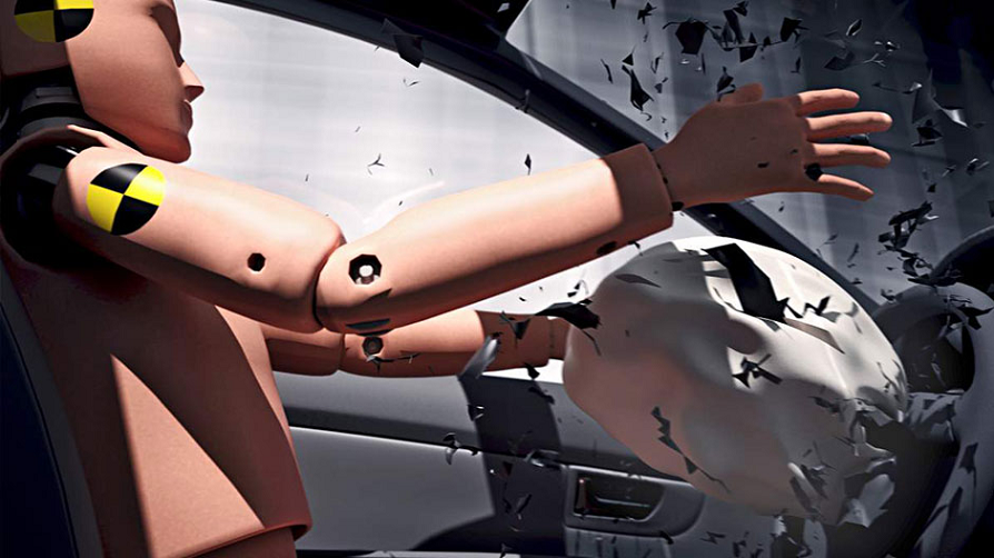 Crash-test dummy with exploding airbag and schrapnel