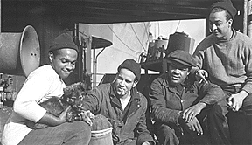 Photograph: The crew of The Booker T. Washington with the ship's mascot