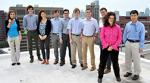 Interns from Volpe's Pathways Programs pose on the roof.