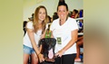 Blake Johnson’s caregivers, Lisa Prasso, physical therapist at WRNMMC, Theresa Johnson and Carlos, Blake’s “puppy,” at Freedom Aquatic and Fitness Center in Manassas, Virginia, on June 27.