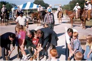 Photo of a group of people attending opening day and dedication of the Lake Mineral Wells State Park and Trailway in Texas.