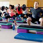 Picture of an exercise class using light weights 