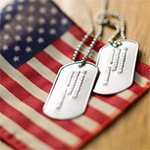 Dog tags and U.S. flag