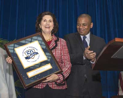 President Lyndon B. Johnson’s daughter, Lynda Johnson Robb, represented the family at the kickoff event. Secretary Foxx presented a framed USDOT 50th Anniversary logo to Robb for the family’s collection.