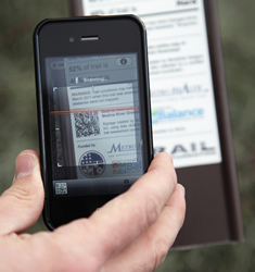 A smartphone scanning a QR code