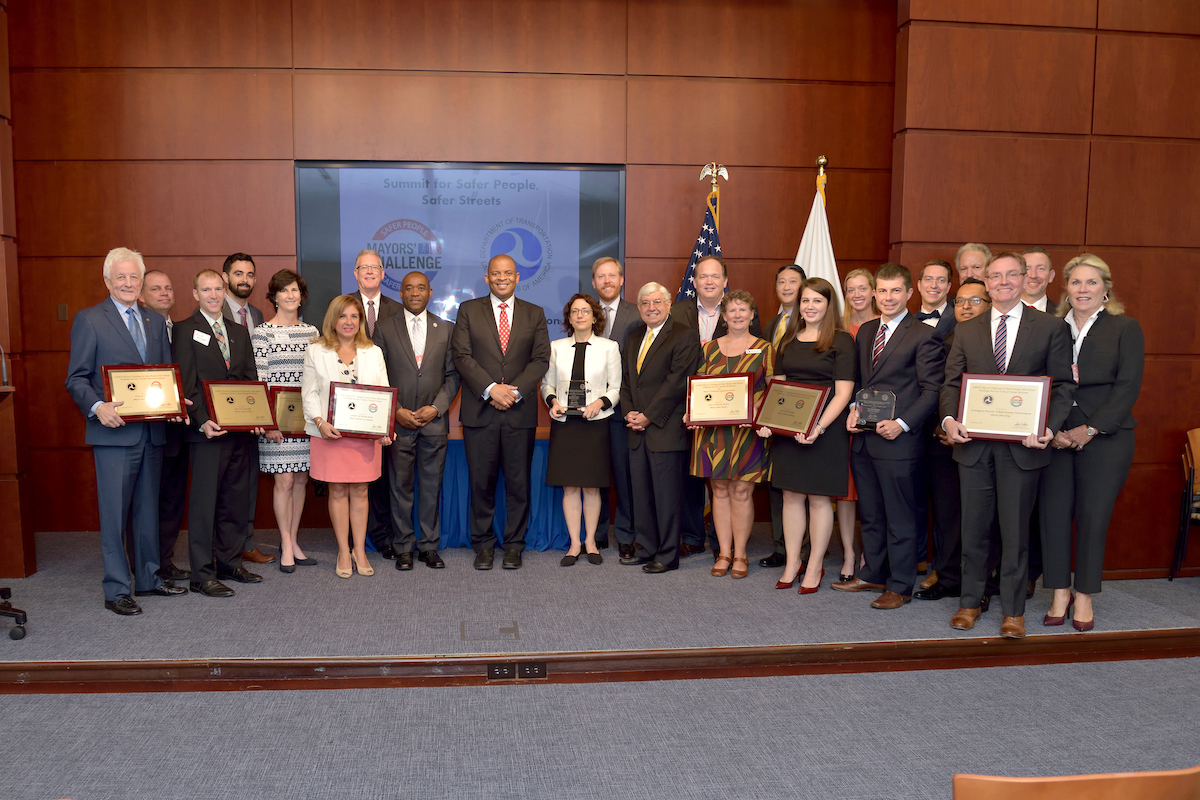 Picture of award winners with Secretary Foxx