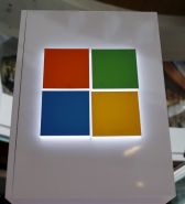 A Microsoft logo is seen at a pop-up site for the new Windows 10 operating system at Roosevelt Field in Garden City, New York July 29, 2015. Microsoft Corp's launch of its first new operating system in almost three years, designed to work across laptops, desktop and smartphones, won mostly positive reviews for its user-friendly and feature-packed interface.REUTERS/Shannon Stapleton - RTX1MBUY