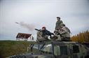 Airman Jeffery Gibson, a 354th Security Forces Squadron response force member, fires a Mark-19 grenade launcher Sept. 9, 2015, at Eielson Air Force Base, Alaska. Members of the squadron must show proficiency annually to be qualified on the weapon. (U.S. Air Force photo/Staff Sgt. Shawn Nickel)