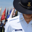 Battalion commander bows his head.