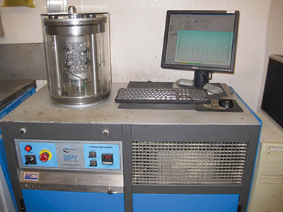 Shown here, the new asphalt mixture performance tester is used to evaluate Superpave mixtures.