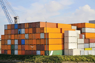 Stacks of shipping containers at this port are among the signs of the increasing demand for freight planning in the United States. New FHWA and NHI professional development opportunities, including training, help transportation officials hone the skills necessary to manage the growth in freight movement.