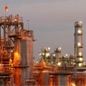 Picture of a chemical facility at dusk with lights on