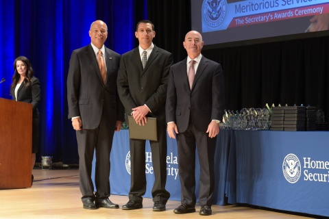 Secretary of Homeland Security Jeh Johnson and Deputy Secretary of Homeland Security Alejandro Mayorkas presented the Secretary’s Meritorious Silver Service Medal to Joseph Malmay, Nov. 3, 2015.