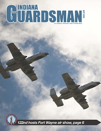 Indiana Guardsman October cover, 2 A-10 Airplanes flighting