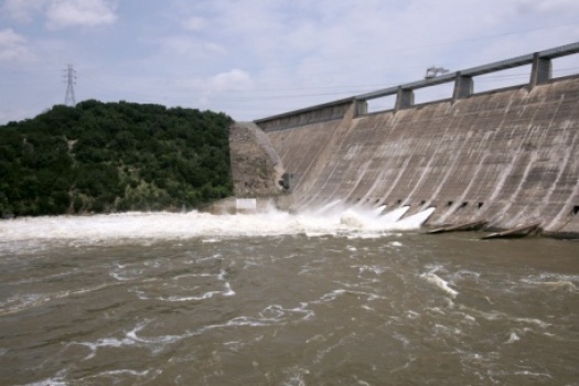 Four open floodgates at Mansfield Dam