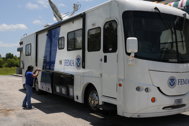 Lake City, Fla., July 9, 2012 -- FEMA Mobile Communications Operations Vehicle (MCOV) Operator Theresa Engel is at the Columbia County Disaster Recovery Center (DRC)where this vehicle is providing tele-communication services to assist Tropical Storm Debby survivors.  George Armstrong/FEMA