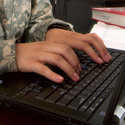 Hands on a computer keyboard