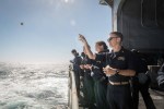 161003 N BR087 173 
PACIFIC OCEAN (Oct. 3, 2016) Lt. Brendan Good, from Talent, Oregon, celebrates Rosh Hashanah by casting bread, symbolizing sin, into the water from USS John C. Stennis' (CVN 74) fantail. Rosh Hashanah is a two day celebration of the Jewish New Year that provides the opportunity to reflect on the past year and look ahead in the New Year. John C. Stennis is underway conducting proficiency and sustainment training. (U.S. Navy photo by Seaman Cole C. Pielop / Released)