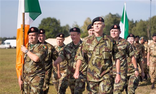 Members of the Croatian delegation stand at attention during the opening ceremonies of Exercise Combined Endeavor 2014. The goal of Combined Endeavor is to foster stronger alliance and regional relations and security arrangements through C4 systems interoperability testing between NATO and Partnership for Peace nations’ strategic and tactical communication systems. (Photo by Air Force Maj. Jason Rossi/Released)