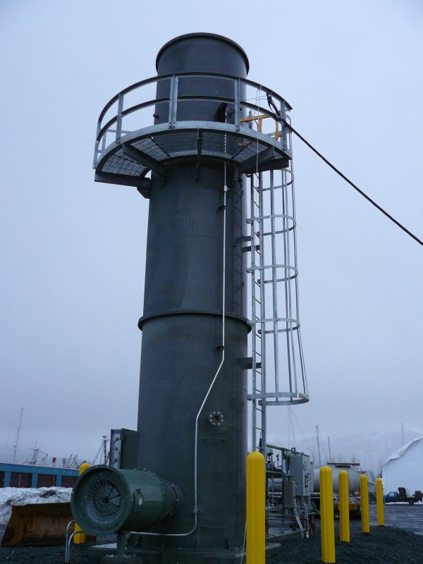 Flare air pollution control device installed by Shoreside Petroleum in Seward, AK, in January 2016, as required by Clean Air Act rules for bulk gasoline terminals.  The control device is a John Zink flare, which burns gas vapors collected from the gas loading rack and one of the gas storage tanks at Shoreside Petroleum's Seward, AK facility. (Photo by U.S. EPA)