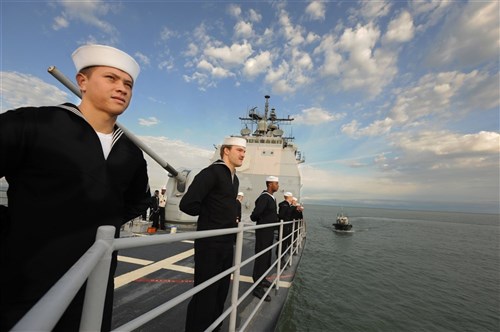 BATUMI, Georgia - (October 17, 2011) - Sailors from the guided missile cruiser USS Philippine Sea (CG 58) man the rails as the ship pulls into port. Philippine Sea is on a regularly scheduled deployment in the Black Sea and serves to promote peace and security in the U.S. 6th Fleet area of responsibility.