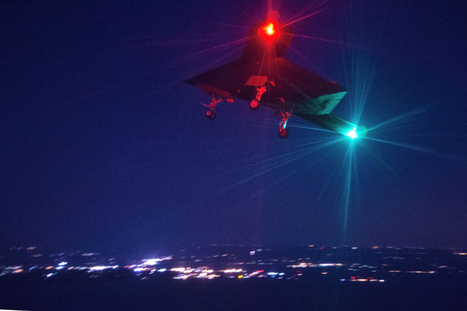 The unmanned X-47B conducts its first night flight April 10 over Naval Air Station Patuxent River, Md. Night flights are the next incremental step in developing the operations concept for more routine UAS flight activity. The Navy will continue to execute X-47B test events to mature standard operating procedures for cooperative use of the airspace with manned aircraft.