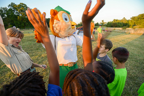 Woodsy Owl and kids at Every Kid in a Park Back-to-School Campout