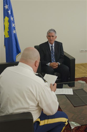 A team from U.S. European Command sits down for a discussion during their four-day training in Pristina June 20. The goal of the training was to get all members of the public relations team to communicate with one voice.
