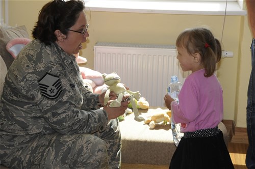 Pabraddd, Lithuania -- Members from the Pennsylvania National Guard visited the Pabrades Vaiku Globas Numai orphanage June 20. During the visit Guard members repaired sports and playground equipment, assisted with landscaping chores and visited and played with the children at the facility. Nearly 50 troops from the Pennsylvania National Guard are in Lithuania supporting Amber Hope 2011, a NATO exercise with more than 2,000 participants from nine countries.