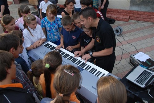 The U.S. Army Europe Band  and Chorus played to enthusiastic audiences in Chisinau and Balti over the weekend. On Monday, 
the band split into smaller groups and visited three Moldovan schools and one orphanage in Straseni, Congaz and Singerei, performing for an estimated 1,400 very appreciative children.