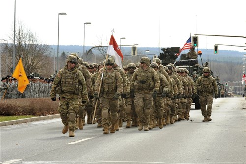 Soldiers with 3rd Squadron, 2nd Cavalry Regiment parade through Rose Barracks, April 1, 2015 after returning from a deployment in support of Operation Atlantic Resolve. Before reaching their home station, 2nd Cavalry Regiment drove 1,800 km from Estonia through Lithuania, Poland, Latvia, the Czech Republic and finally Germany. The road march was called Dragoon Ride and it exercised the unit’s maintenance and leadership capabilities and demonstrated the freedom of movement that exists within NATO. (U.S. Army photo by Visual Information Specialist Markus Rauchenberger/released)