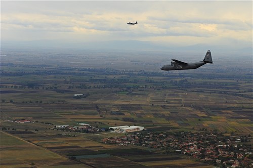 C-130J aircraft from the 37th Airlift Squadron, Ramstein Air Base, Germany, fly over Plovdiv, Bulgaria, during Exercise Thracian Fall 2011, Oct. 17, 2011. Thracian Fall is an off-station training exercise designed to enhance interoperability between U.S. and Bulgarian Air Forces as well as build partnerships with paratroopers from both. 