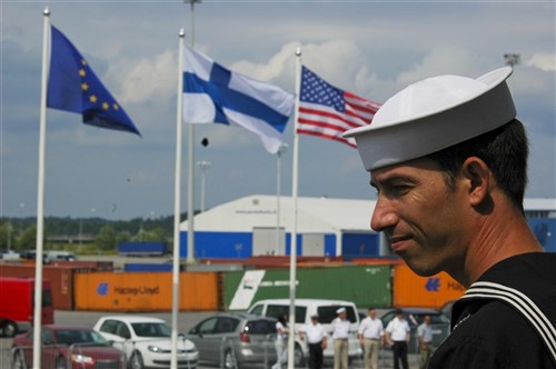 TURKU, Finland (July 11, 2011) - Yeoman 1st Class Anthony Contino mans the rails aboard the guided-missile frigate USS Carr (FFG 52) as the ships enters Turku. Carr is homeported out of Norfolk, Va., and is on a scheduled three-month deployment supporting maritime security operations and theater security cooperation efforts in the U.S. 6th Fleet area of responsibility. (U.S. Navy photo by Mass Communication Specialist 1st Class Gary Keen/Released)