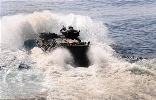 USS BATAAN, Atlantic Ocean (June 23, 2011) - An amphibious assault vehicle from Battalion Landing Team, 2nd Battalion, 2nd Marine Regiment, 22nd Marine Expeditionary Unit (MEU), exits the well deck of the multipurpose amphibious assault ship USS Bataan (LHD 5), June 23. Bataan is the command ship of the Bataan Amphibious Ready Group, participating in the bilateral Spanish Amphibious Landing Exercise (PHIBLEX) 2011 off the coast of Spain. 