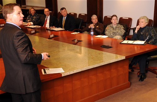 STUTTGART, Germany (Apr. 11, 2011) François Bellon, head of the International Committee of the Red Cross Delegation to NATO, EU and the Kingdom of Belgium, addresses military and civilian officials from the U.S. European Command (EUCOM) during a scheduled visit to the command at the invitation of EUCOM's Interagency Partnering Directorate (J9).  Bellon and Aleardo Ferretti, Senior Delegate to NATO and European Armed Forces, visited EUCOM in order to familiarize the command with ICRC's mission, capabilities and current priorities including Syria and Israel. Established in 1863, the ICRC is an independent and neutral organization based in Geneva whose goal is to provide humanitarian relief for people affected by conflict and armed violence, and also promote the laws that protect victims of war.