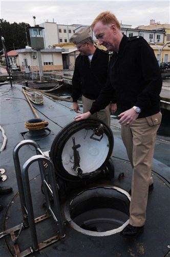 SIGONELLA, Sicily (February 4, 2010) Rear Adm. James G. Foggo, deputy commander, U.S. 6th Fleet, prepares to go below the decks of a S524 ITS Primo Longobardo Italian submarine during Exercise Proud Manta 2011. Proud Manta is designed to provide operational training in air, surface, and subsurface cooperation and coordination anti-surface warfare operations in potential NATO response force task/roles and missions. (U.S. Navy photo by Mass Communication Specialist 2nd Class Gary A. Prill/Released)