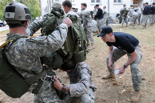 STUTTGART, Germany &mdash; An instructor from the U.S. Army Jumpmaster Mobile Training Team observes as a student performs his Jumpmaster personnel inspections sequence. The 10th Special Forces Group (Airborne) MTT came from Fort Carson, Colo. to conduct the two-week course at Panzer Kaserne here, for airborne qualified soldiers. (Special Operations Command-Europe photo by Army Master Sgt. Donald Sparks)