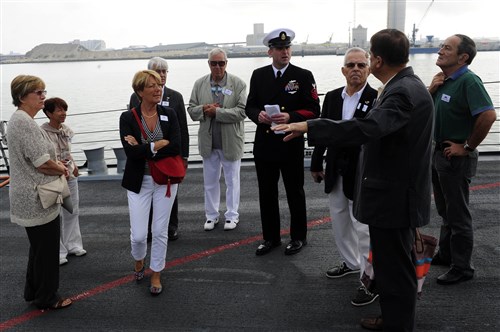 LA ROCHELLE, France  - A member of the France-Etats-Unis Group asks Chief Electronics Technician Jason Howes asks
question during a tour of the guided-missile destroyer USS Farragut (DDG 99), while in port La Rochelle. Farragut is on a scheduled deployment in support of maritime security operations and theater security cooperation efforts in the U.S. 6th Fleet area of responsibility.