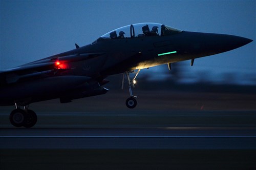 An F-15E Strike Eagle assigned to the 492nd Fighter Squadron takes off from Royal Air Force Lakenheath, England, Feb. 5, 2015. The pilot’s training focuses on maintaining joint readiness while building interoperable capabilities. (U.S. Air Force photo by Airman 1st Class Dawn M. Weber/Released)
