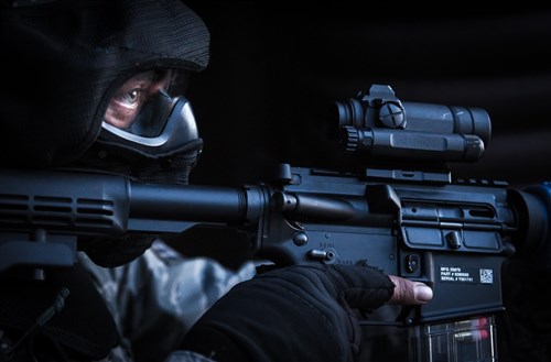 A U.S. Air Force security forces Airman secures the outside of a hardened facility after neutralizing the opposing force during a combat training course on Ramstein Air Base, Germany, May 30, 2015. Battlefield Leaders Assaulter Course, Integrated Combat Essentials -- or BLAC ICE is designed to teach security forces members from multiple countries advanced tactics and shooting skills for use in the event of a base security breach. (U.S. Air Force photo/ Tech. Sgt. Ryan Crane)