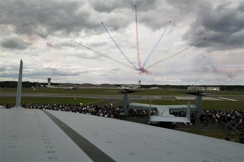 The Royal Air Force Aerobatic Team 'Red Arrows' amaze thousands of spectators with an aerial demonstration, July 15, 2012, during the Farnborough International Air Show in Farnborough, England. More than 250,000 trade and public visitors attend the bi-annual event which concluded today. 