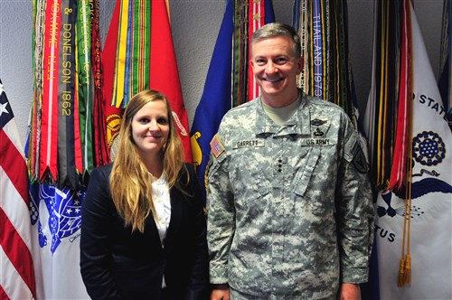 STUTTGART, Germany - Ms. Erika Evans, University of North Georgia student, met with Lt. Gen. William Garrett III, U.S. European Command Deputy Commander here Jun. 11, 2015.  Evans successfully completed a four-month internship with EUCOM's J-5/8 Policy, Strategy and Partnering Directorate and was recently selected as a Fulbright Scholar to continue her studies in International Affairs.  Lt. Gen. Garrett, a University of North Georgia alumnus, presented Evans with a coin and thanked her for her outstanding work, especially her efforts in support of the Northern European Chiefs of Defense Conference held in Copenhagen, Denmark, May 27-28.