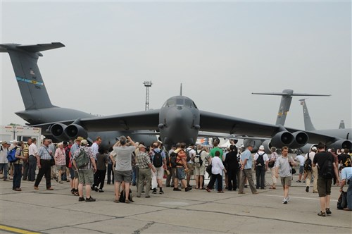 BERLIN, Germany &mdash; Visitors look at the B-52 Stratofortress during the ILA 2010 Berlin International Aerospace Exhibition and Conferences June 11. The B-52 flew in from Barksdale Air Force Base, La., to participate in the Berlin Air Show, which features 1,153 exhibitors from 47 countries, including the United States. (U.S. Air Force photo by Staff Sgt. Julius Delos Reyes)