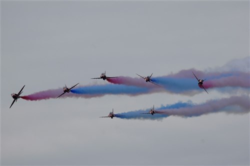 The Royal Air Force Aerobatic Team 'Red Arrows' amaze thousands of spectators with an aerial demonstration, July 15, 2012, during the Farnborough International Air Show in Farnborough, England. More than 250,000 trade and public visitors attend the bi-annual event which concluded today.