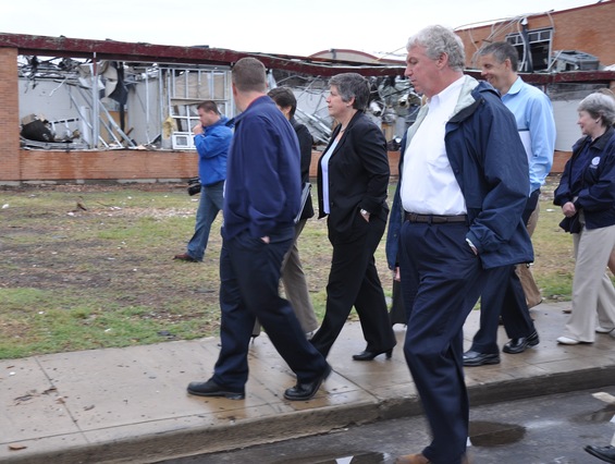  Joplin, Mo., September 22, 2011 -- Homeland Security Secretary Janet Napolitano (middle), FEMA Deputy Administrator Richard Serino (right) and Secretary of Education Arne Duncan tour the damaged high school. Just four months after a tornado destroyed the school, students were able to start the new school year on time in temporary facility.