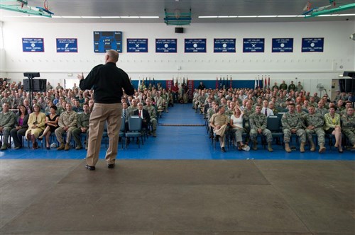 STUTTGART, Germany - Admiral James Stavridis, U.S. European Command and NATO Supreme Allied Commander Europe, speaks to Soldiers, Sailors, Airmen, Marines and civilians of US European Command, EUCOM, at an "All Hands Call" held by the Commander in Patch Barracks fitness center in Stuttgart-Vaihingen, Germany, August 6, 2012. The commander began by wishing the command a happy birthday since August 1, 2012 mark 60 years since EUCOM's inception.