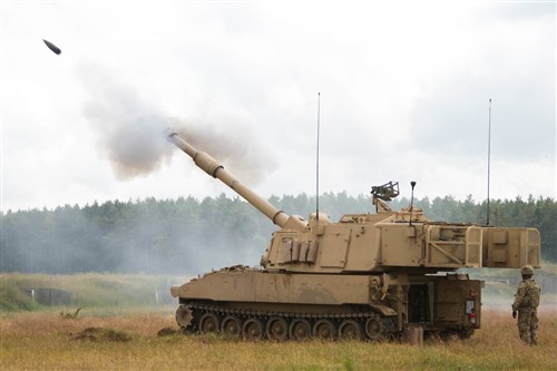Soldiers with C Battery, 1st Battalion, 41st Field Artillery Regiment, fire a Paladin M109A6 Artillery System June 18, 2015 at the Drawsko Pomorskie Training Area in Poland during Saber Strike 15. Encompassing more than 6,000 participants from 13 different nations, Saber Strike is a longstanding U.S. Army Europe-led cooperative training exercise. Designed to improve joint operational capability in a range of missions as well as preparing the participating nations and units to support multinational contingency operations, this year's exercise takes place across Estonia, Latvia, Lithuania and Poland. (U.S. Army photo by Spc. Marcus Floyd, 13th Public Affairs Detachment)
