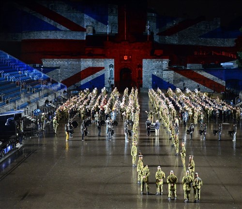 As the British Union Jack is projected onto Edinburgh castle, international military and civilian musicians from the U.S., Norway, Australia, U.K. and Canada rehearse the massed military band segment for the Royal Edinburgh Military Tattoo. This military tattoo brings together musicians, dancers and bagpipers from around the world to perform in Europe’s most prestigious military tattoo, which is being held Aug. 3-25.